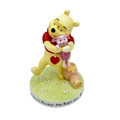 english ladies disney winnie the pooh a hug is always the right size figurine - Charterwells