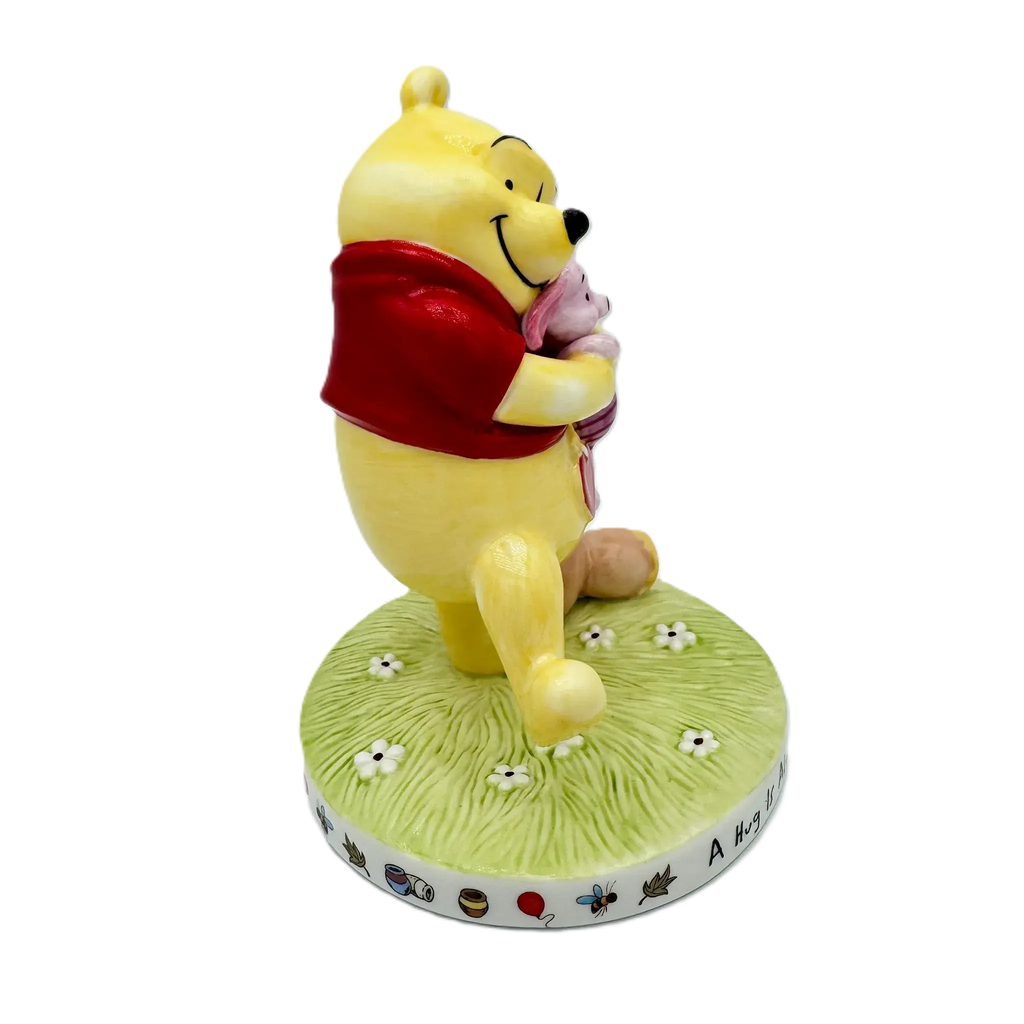 english ladies disney winnie the pooh a hug is always the right size figurine - Charterwells