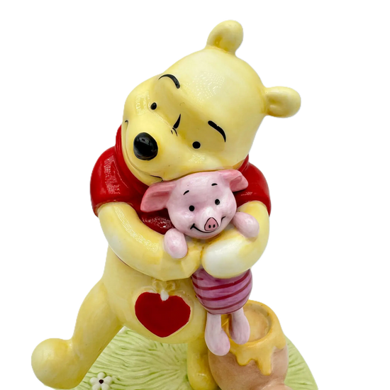 english ladies disney winnie the pooh a hug is always the right size figurine - Charterwells