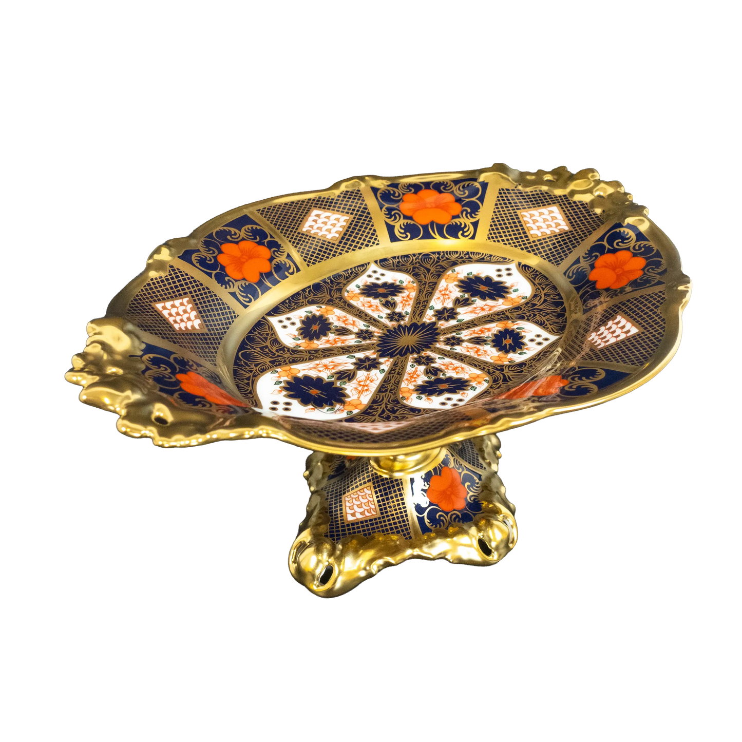 Decorative ceramic plate with gold and blue patterns on a white background