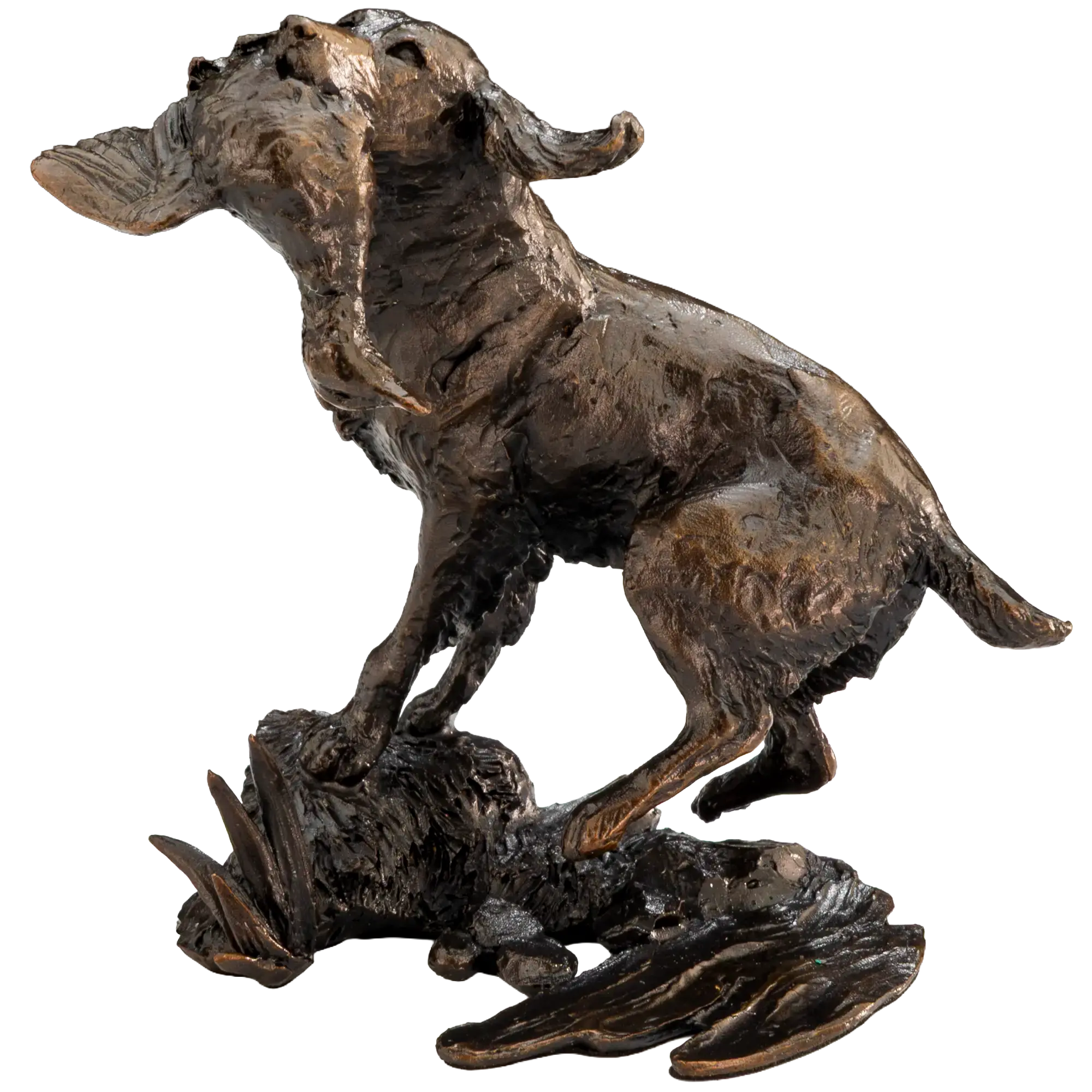 A bronze sculpture of a dog standing over a fallen animal on a textured base, shown against a plain white background.