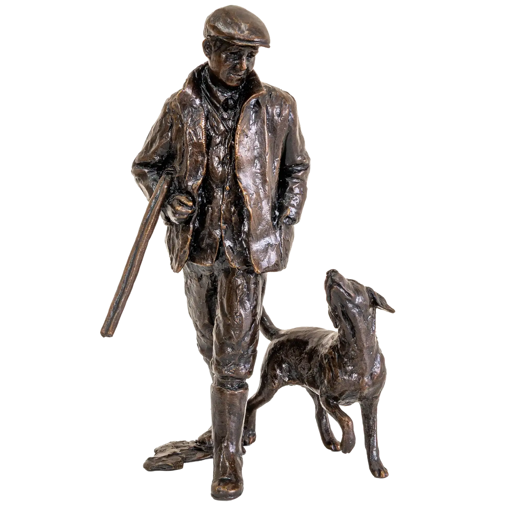 Bronze statue of a man with a dog on a white background