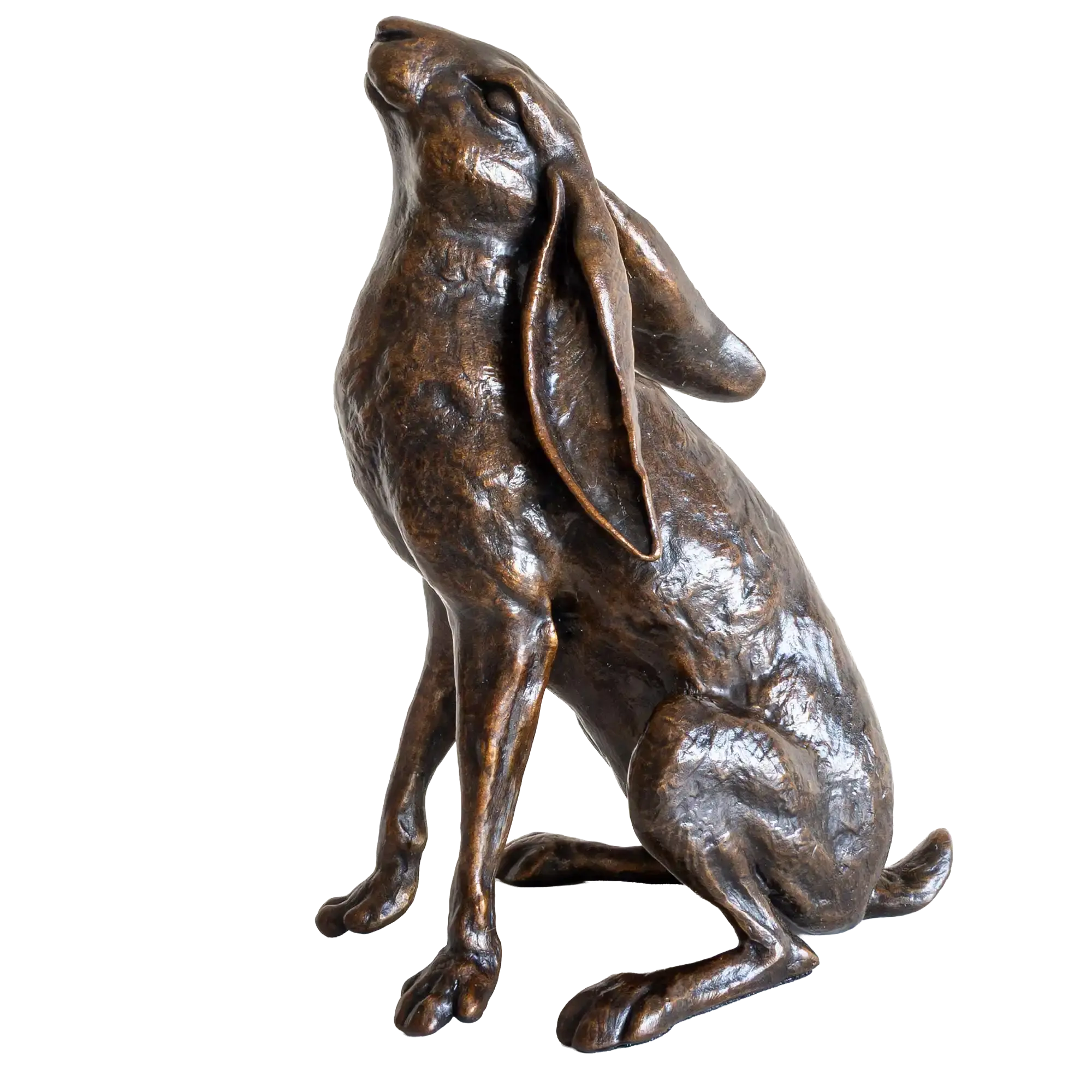 Bronze statue of a rabbit on a white background