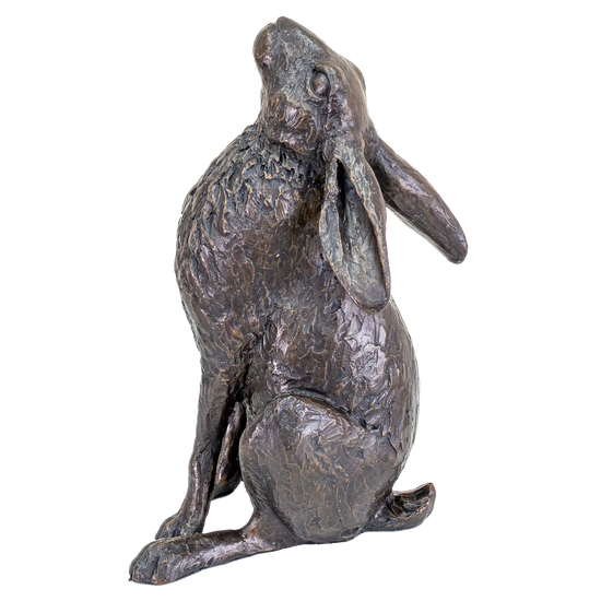 Bronze statue of a rabbit on a white background