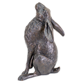 Bronze statue of a rabbit on a white background