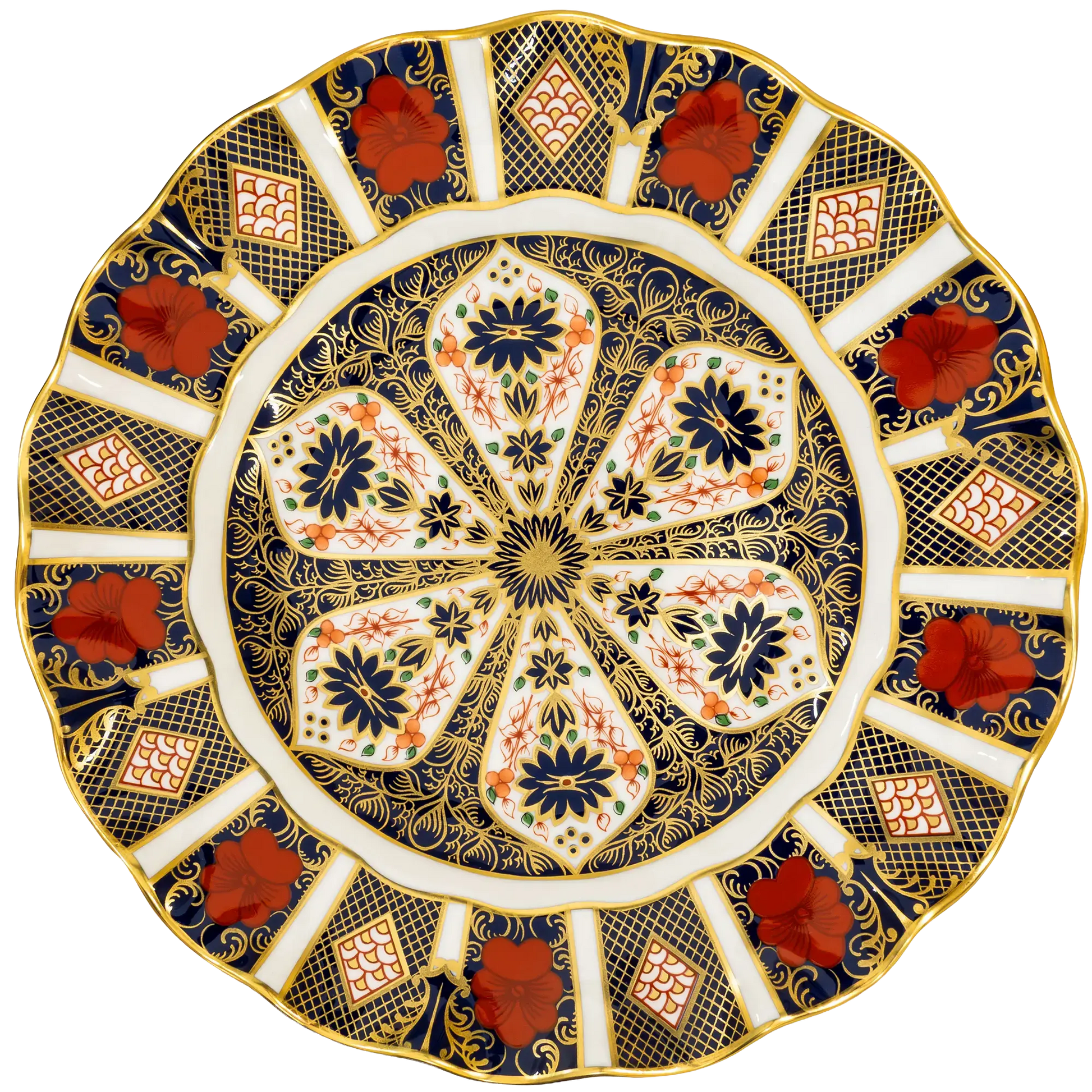 An ornate round ceramic plate with a scalloped rim, featuring a detailed floral and geometric pattern in navy blue, gold, white, and terracotta red.