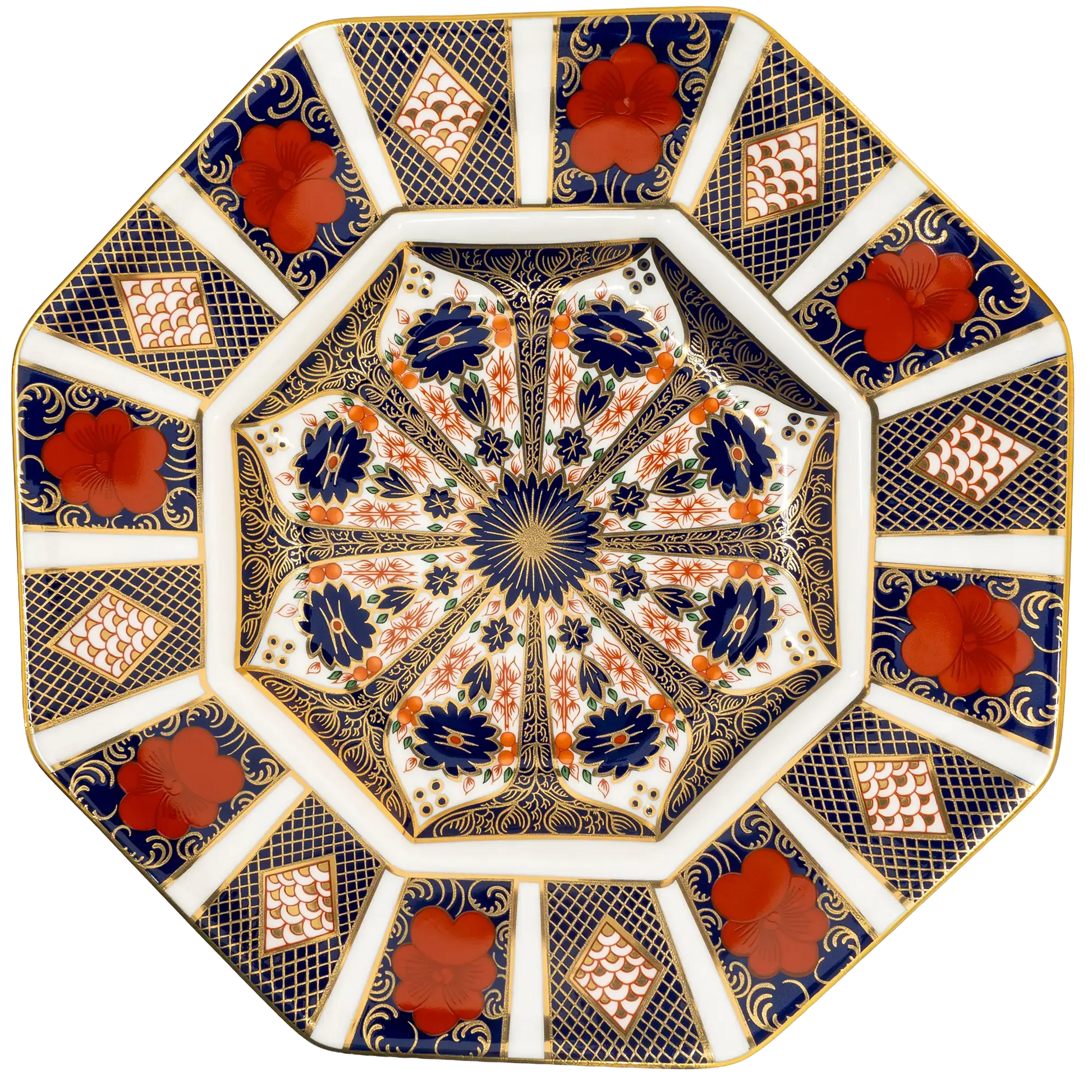 An ornate octagonal ceramic plate featuring a complex floral and geometric pattern in navy blue, terracotta red, gold, and white.