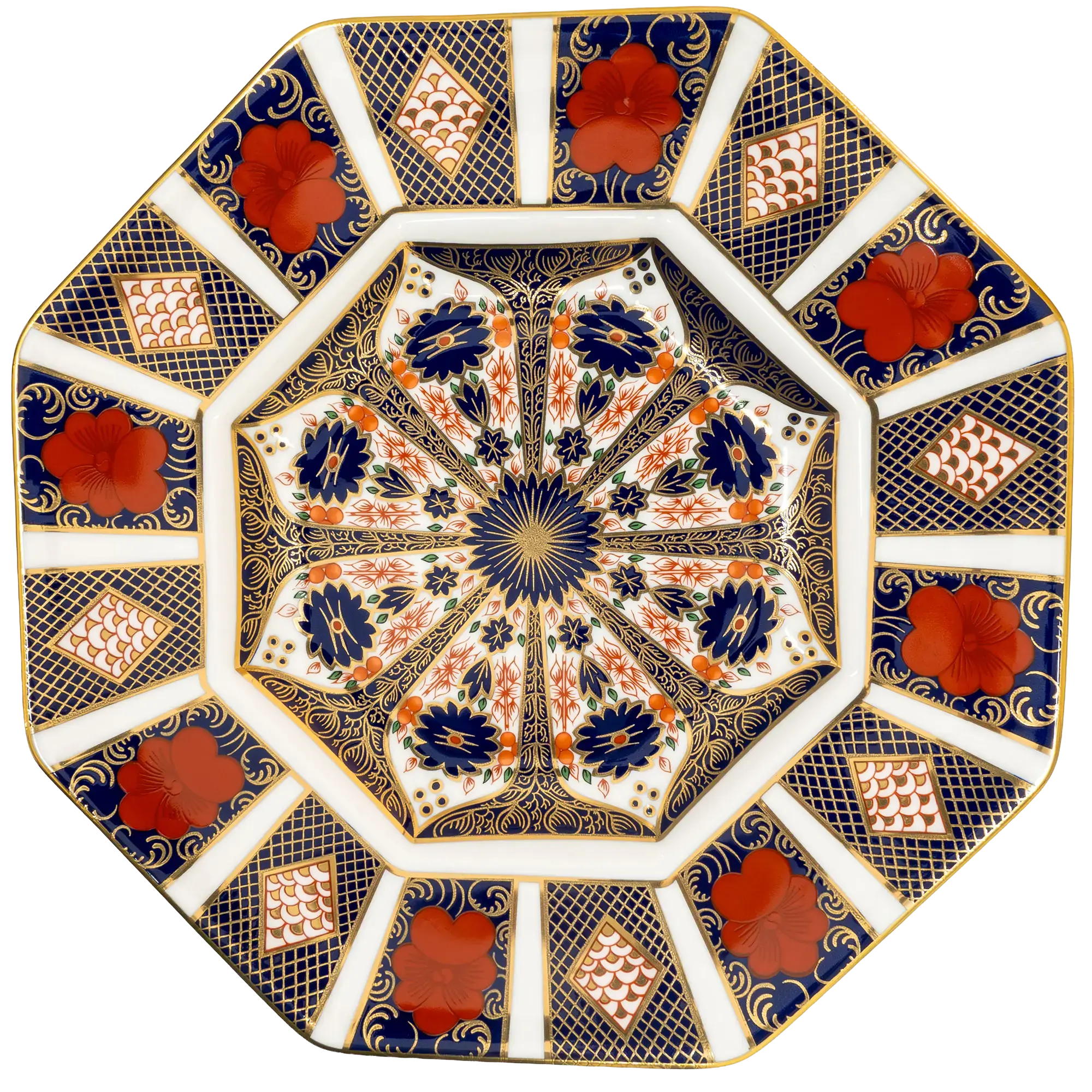 An ornate octagonal ceramic plate featuring a complex floral and geometric pattern in navy blue, terracotta red, gold, and white.