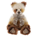 Charlie Bears Oddisey - brown and white teddy bear wearing a grey bow around neck and a necklace with a key charm