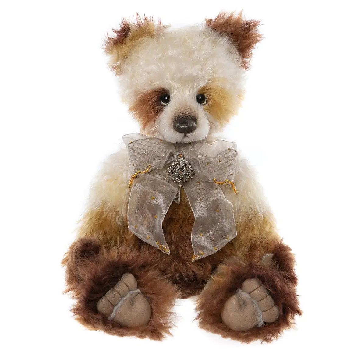 Charlie Bears Oddisey - brown and white teddy bear wearing a grey bow around neck and a necklace with a key charm